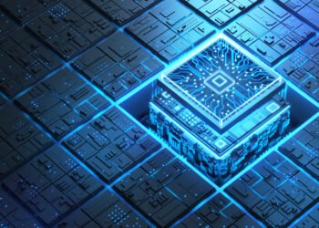 Blue glowing futuristic semiconductor and circuit board.