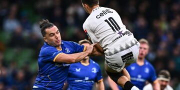 Dublin , Ireland - 11 October 2025; James Lowe of Leinster in action against Jean Smith of Hollywoodbets Sharks during the United Rugby Championship match between Leinster and Hollywoodbets Sharks at the Aviva Stadium in Dublin. (Photo By Tyler Miller/Sportsfile via Getty Images)